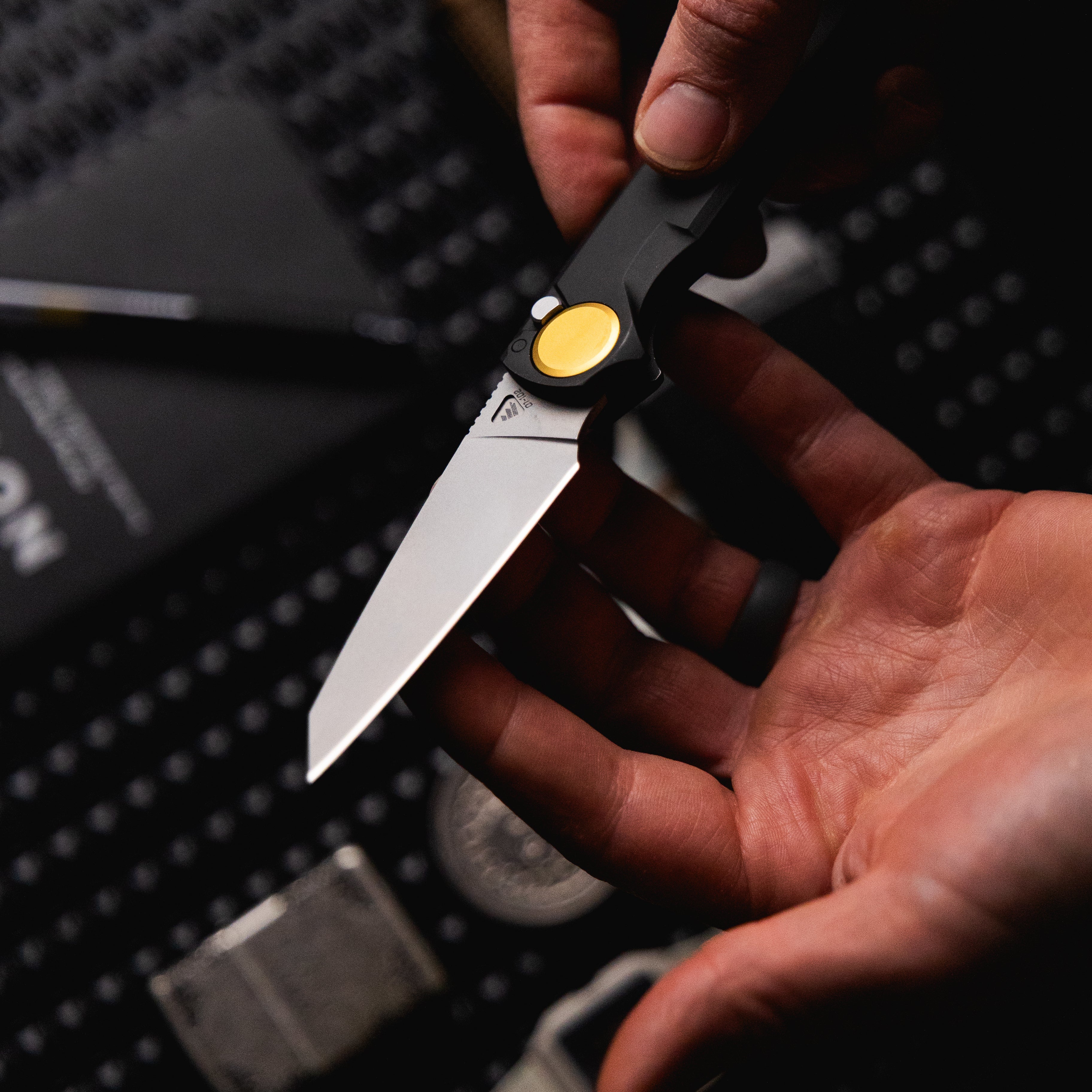 Live view of RMX™ Reverse Tanto in hand with extended blade